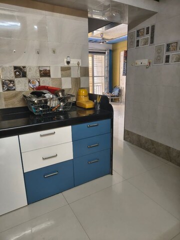 Kitchen in 2 BHK Apartment at RV Waman Heights, Dombivli West – for Sale