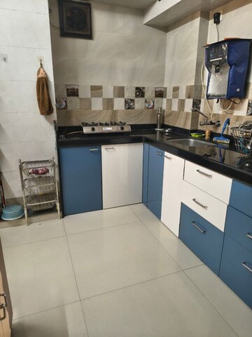 Kitchen in 2 BHK Apartment at RV Waman Heights, Dombivli West – for Sale