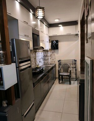 Kitchen in 2 BHK Apartment at Wave Dream Homes, Wave City – for Rent