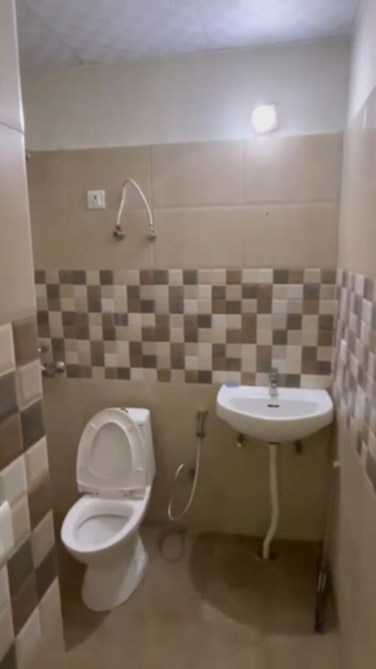 Bathroom, renowned-lotus-srishti 2 Bedroom 1022 Sq.Ft. Apartment In Sain Vihar Ghaziabad 10035236