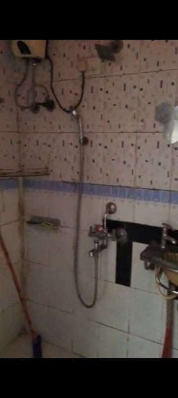 Bathroom in 2 BHK Apartment at Tilak Nagar – for Rent