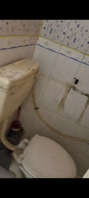 Bathroom in 2 BHK Apartment at Tilak Nagar – for Rent