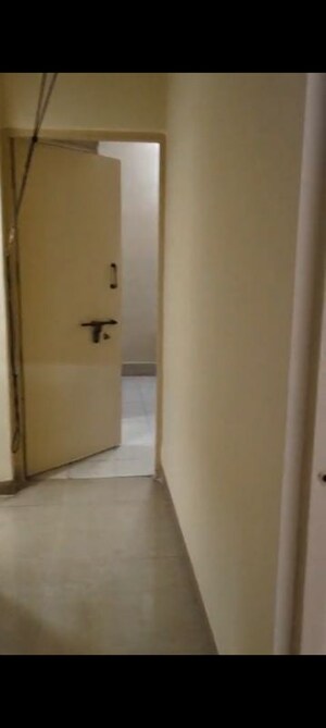 Building Lobby in 2 BHK Apartment at Tilak Nagar – for Rent