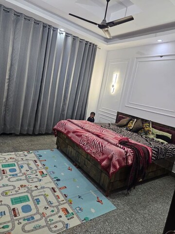 Bedroom in 3 BHK Builder Floor at Jammu and Kashmir Bank Employees CGH, Sector 9a – for Rent