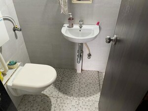 Bathroom in 2 BHK Apartment at Happy Home Heights, Mira Road – for Rent