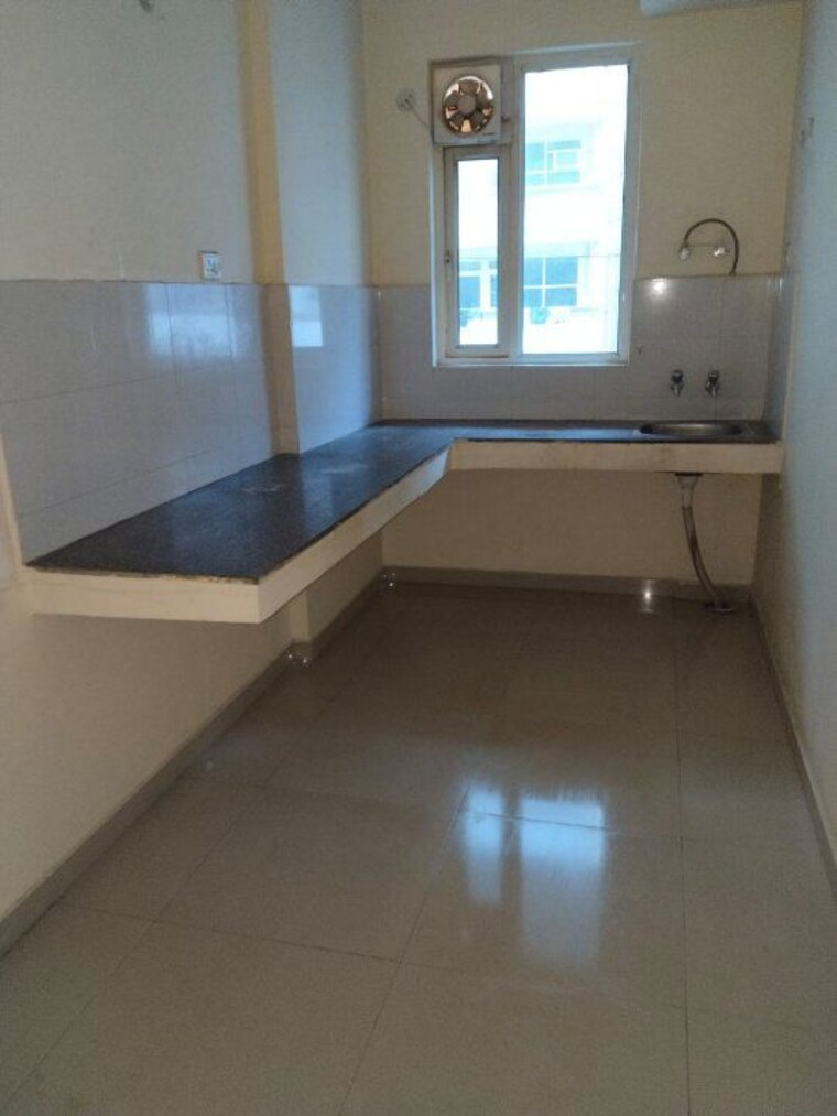 Kitchen, pyramid-midtown 2 Bedroom 700 Sq.Ft. Apartment In Sector 59 Gurgaon 10035354