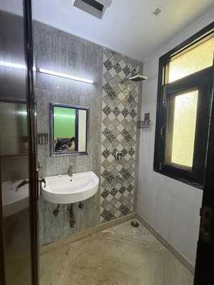 Bathroom in 2 BHK Builder Floor at Kalkaji – for Rent