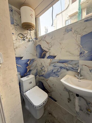 Bathroom in 2 BHK Builder Floor at Kalkaji – for Rent