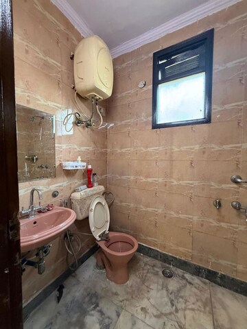 Bathroom in 2 BHK Builder Floor at Kalkaji – for Rent