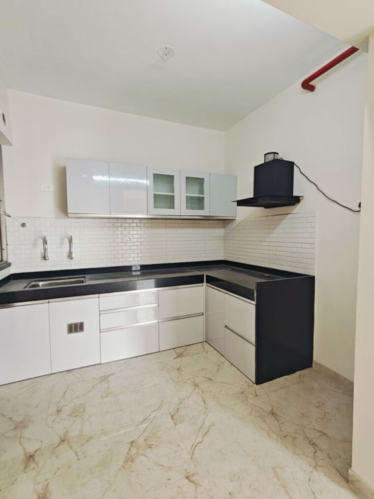 Kitchen, majestique-towers 2 Bedroom 825 Sq.Ft. Apartment In Kharadi Pune 10035454