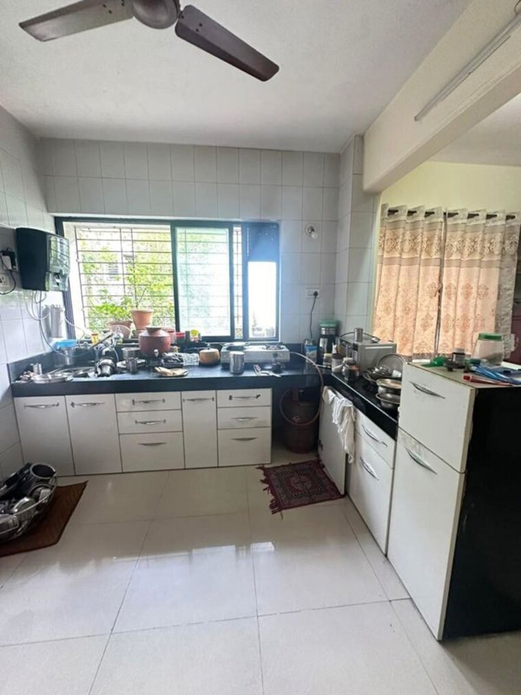 Kitchen, rd-el-homes 2 Bedroom 627 Sq.Ft. Apartment In Baner Pune 10035474