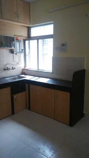 Kitchen in 2 BHK Apartment at Suyog Sankul, Aundh – for Rent