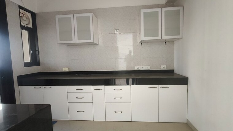 Kitchen, peninsula-celestia-spaces 3 Bedroom 1468 Sq.Ft. Apartment In Parel Mumbai 10035492