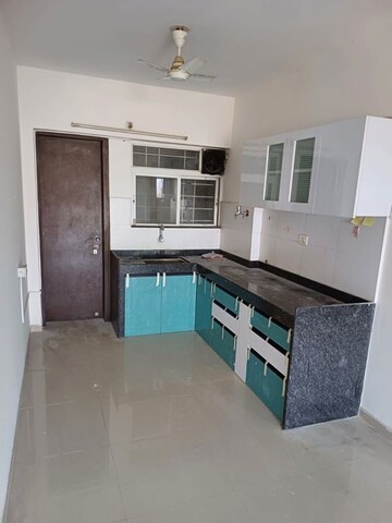 Kitchen in 2 BHK Apartment at Mantra Insignia, Mundhwa – for Rent