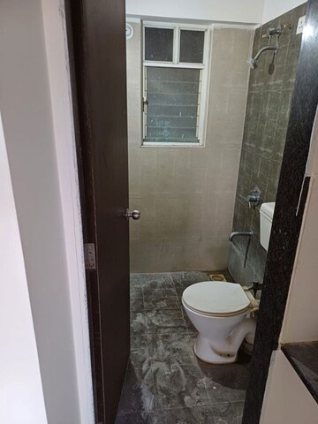 Bathroom in 2 BHK Apartment at Mantra Insignia, Mundhwa – for Rent