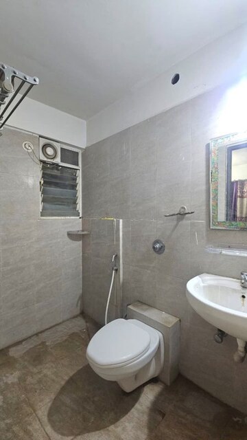 Bathroom in 1 BHK Apartment at Kamdhenu 7th Heaven, Dhanori – for Rent