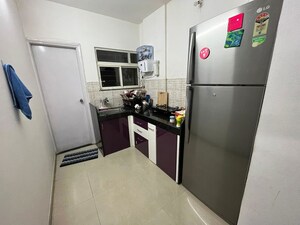 Kitchen in 1 BHK Apartment at Jalan Aura County Pune, Wagholi – for Rent