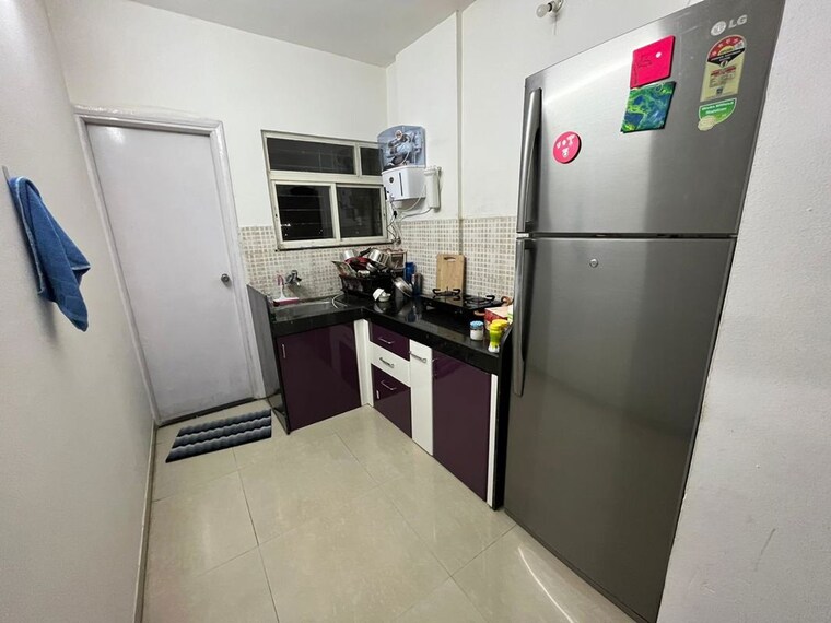 Kitchen, jalan-aura-county-pune 1 Bedroom 650 Sq.Ft. Apartment In Wagholi Pune 10035513