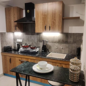 Kitchen in 2 BHK Apartment at Amrapali Heartbeat City, Sector 107 – for Sale