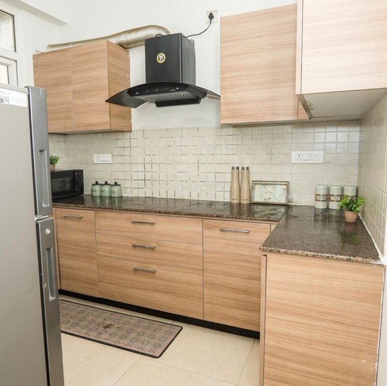 Kitchen, amrapali-heartbeat-city 2 Bedroom 1195 Sq.Ft. Apartment In Sector 107 Noida 10035552