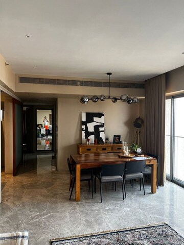 Living Room in 4 BHK Apartment at Rustomjee 9 JVPD, Juhu – for Rent