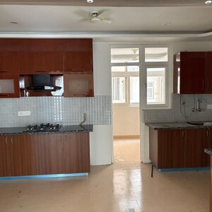 Kitchen in 3 BHK Apartment at Amrapali Heartbeat City, Sector 107 – for Sale