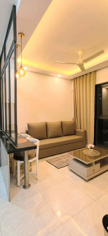 Living Room in 1 BHK Apartment at Lodha Crown Quality Homes, Majiwada – for Sale