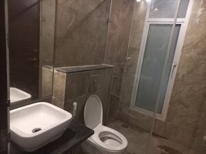 Bathroom in 4 BHK Apartment at Mahagun Mezzaria, Sector 78 – for Sale