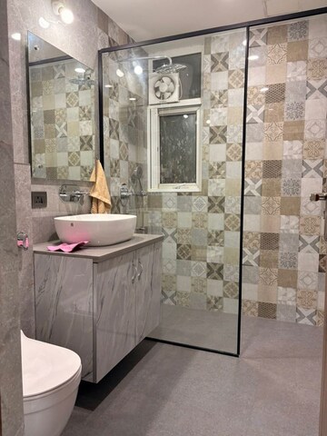 Bathroom in 3.5 BHK Apartment at Orchid Petals, Sector 49 – for Rent