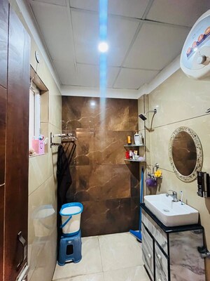 Bathroom in 3 BHK Builder Floor at Dhakoli – for Sale