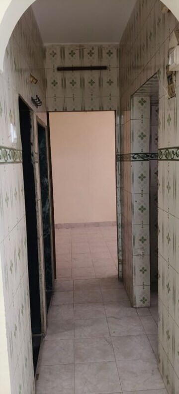 Building Lobby in 1 BHK Apartment at Shelter CHS, Nerul – for Rent