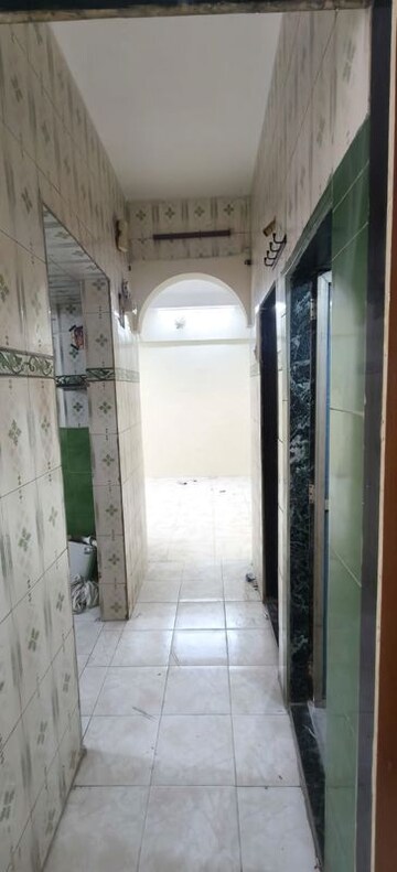 Building Lobby in 1 BHK Apartment at Shelter CHS, Nerul – for Rent