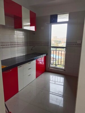 Kitchen in 2 BHK Apartment at Tanvi Eminence I, Mira Road – for Sale