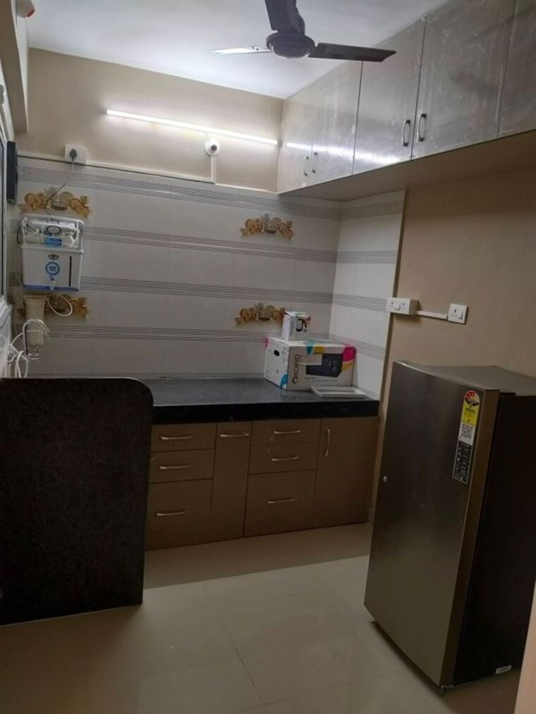 Kitchen, blue-berry 2 Bedroom 850 Sq.Ft. Apartment In Kharadi Pune 10035832