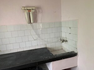 Kitchen in 1 BHK Apartment at Alankapuri CHS, Kothrud – for Rent