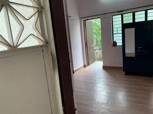 Living Room in 1 BHK Apartment at Alankapuri CHS, Kothrud – for Rent