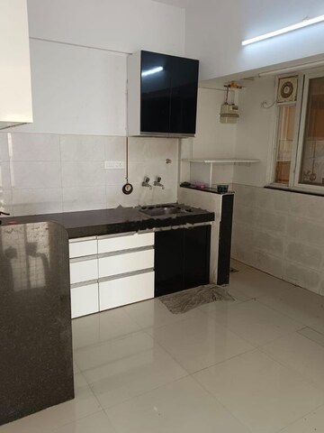 Kitchen in 2 BHK Apartment at Ayaan Society , Wagholi – for Rent