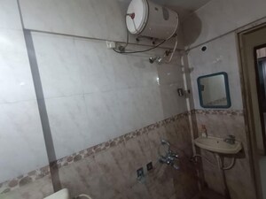 Bathroom in 1 BHK Apartment at Siddhivinayak Ginger, Pimple Saudagar – for Rent