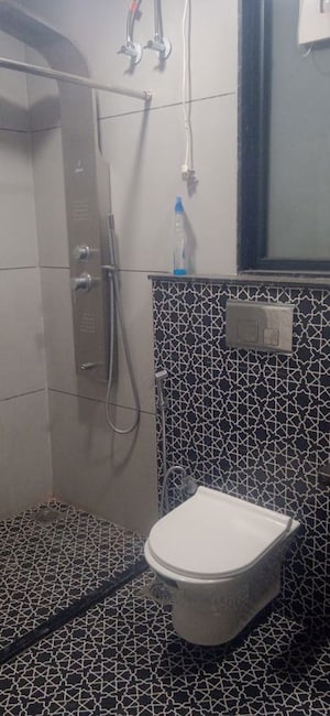 Bathroom in 3 BHK Apartment at Tilak Nagar – for Rent