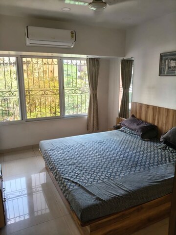 Bedroom in 3 BHK Apartment at Samartha Aangan, Andheri West – for Rent