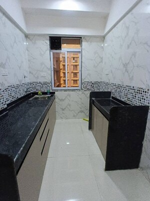 Kitchen in 1 BHK Apartment at DGS Sheetal Tapovan, Malad East – for Rent