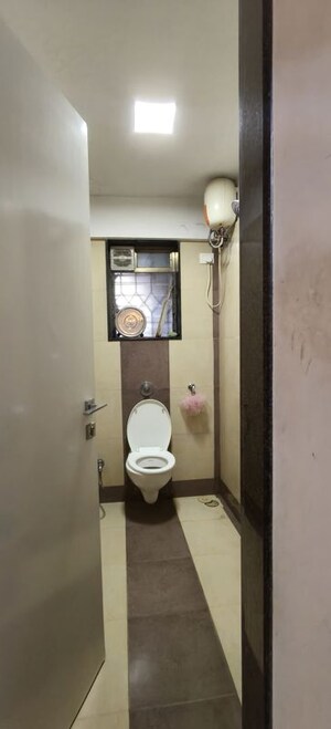 Bathroom in 2 BHK Apartment at Palash Towers, Andheri West – for Sale