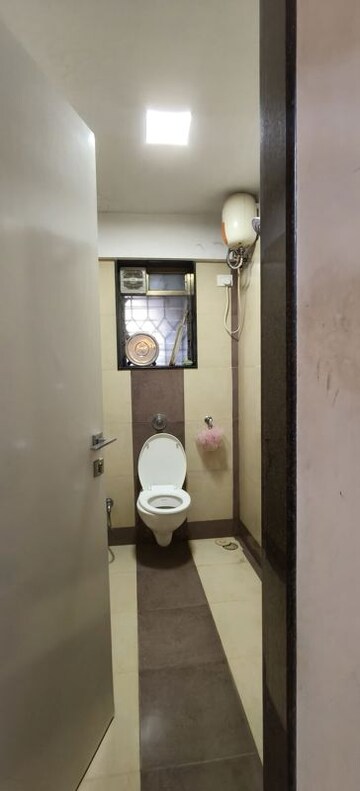 Bathroom in 2 BHK Apartment at Palash Towers, Andheri West – for Sale