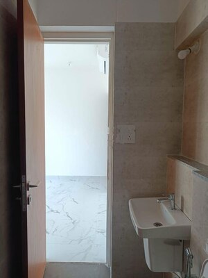 Bathroom in 2 BHK Apartment at Dynamix Avanya, Dahisar East – for Rent