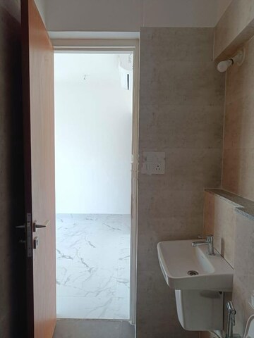 Bathroom in 2 BHK Apartment at Dynamix Avanya, Dahisar East – for Rent