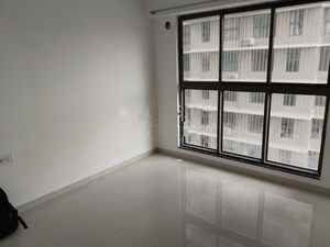Master Bedroom in 1 BHK Apartment at UK Iridium, Kandivali East – for Rent