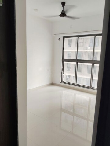 Bedroom in 1 BHK Apartment at UK Iridium, Kandivali East – for Rent