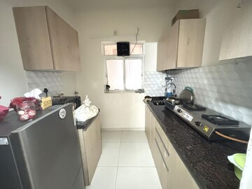 Kitchen in 1 BHK Apartment at Godrej Green Vistas, Mahalunge – for Rent