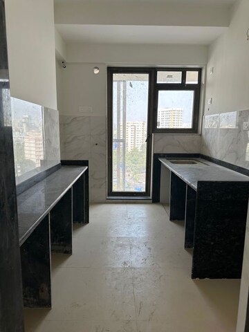 Kitchen in 2 BHK Apartment at Naman Habitat, Andheri West – for Sale