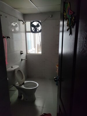 Bathroom in 2 BHK Apartment at Charms Castle, Raj Nagar Extension – for Sale